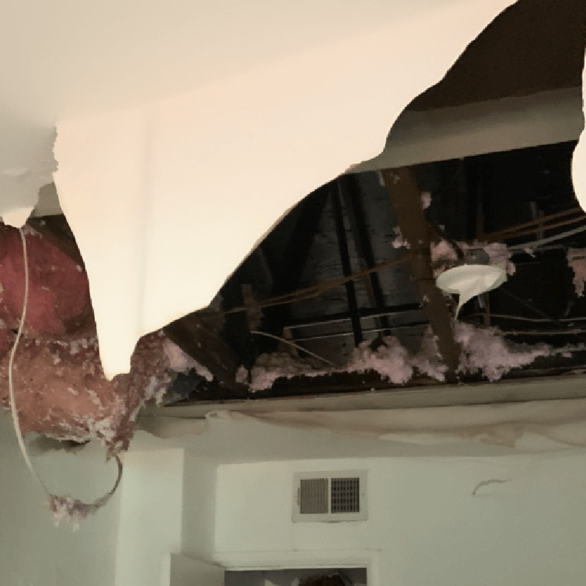 Ceiling-Water-Damage-From-Attic-Roof-Leak.png