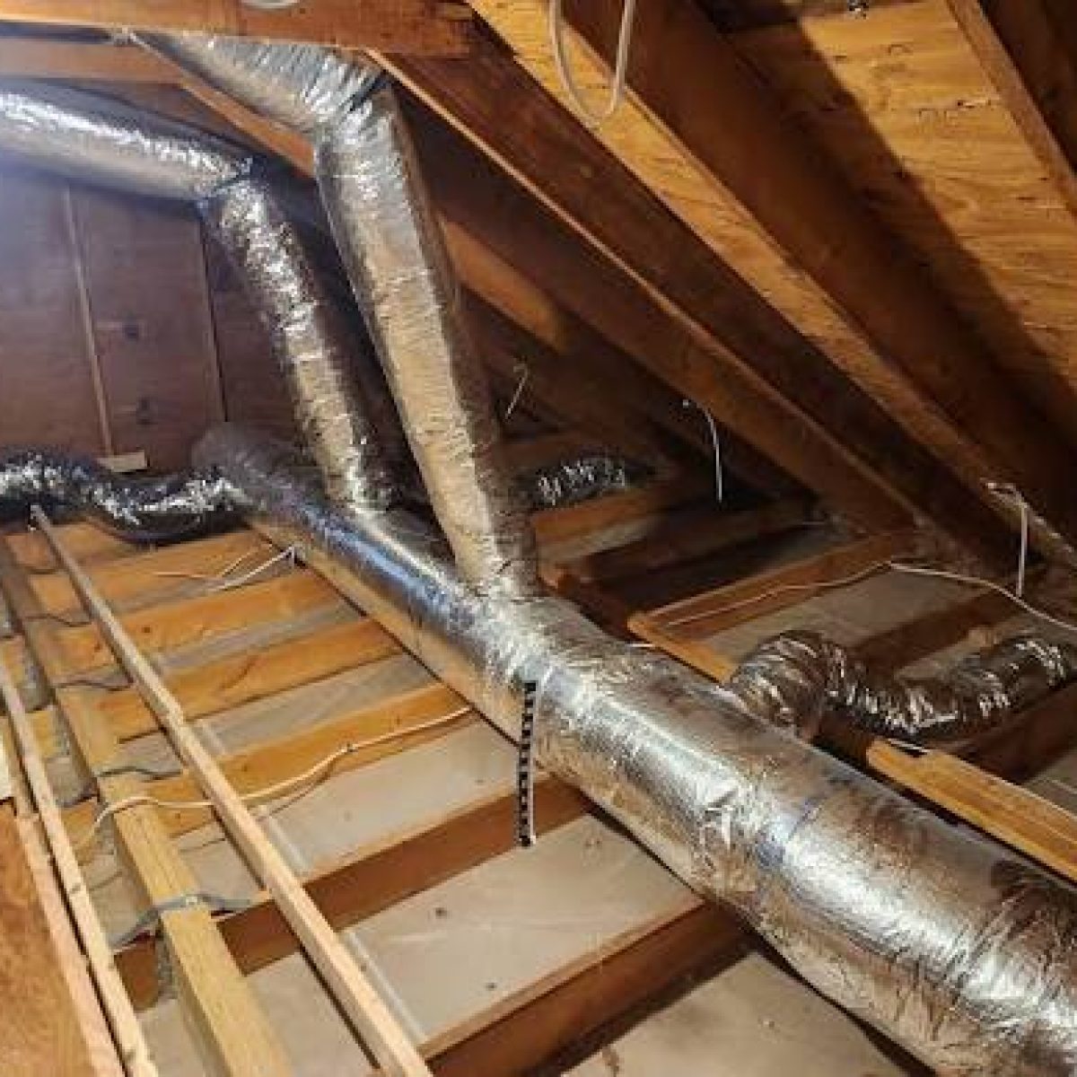 Attic area being evaluated for roof leak damage in The Hammocks, FL
